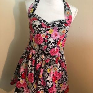 A pin up mid length dress.